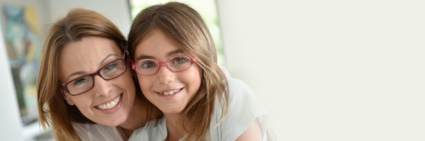 Mother and Daughter wearing Glasses from Optometrist